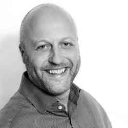 Daniel Ingram Brown headshot black and whte smaller square